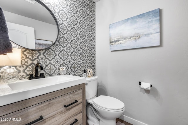 8738 W Runion Dr, Peoria, AZ 85382 - bathroom featuring toilet, vanity, and baseboards