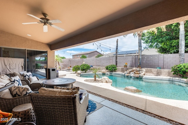 8738 W Runion Dr, Peoria, AZ 85382 - fenced backyard with a patio and ceiling fan