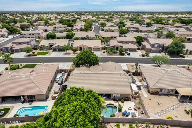8738 W Runion Dr, Peoria, AZ 85382 - aerial perspective of suburban area featuring a pool area and a mountainous background