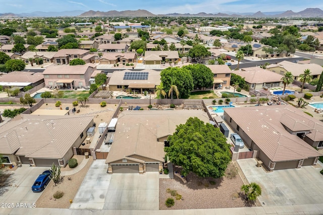 8738 W Runion Dr, Peoria, AZ 85382 - aerial perspective of suburban area with a mountainous background