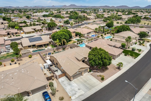 8738 W Runion Dr, Peoria, AZ 85382 - aerial perspective of suburban area with a mountainous background