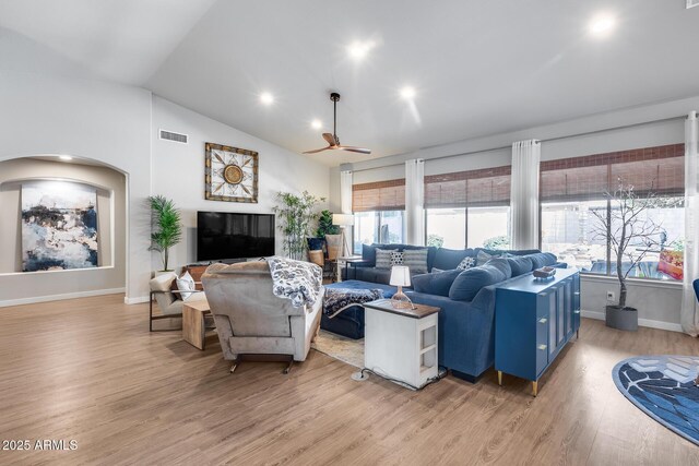8738 W Runion Dr, Peoria, AZ 85382 - living area featuring ceiling fan, light wood-style flooring, lofted ceiling, baseboards, and recessed lighting