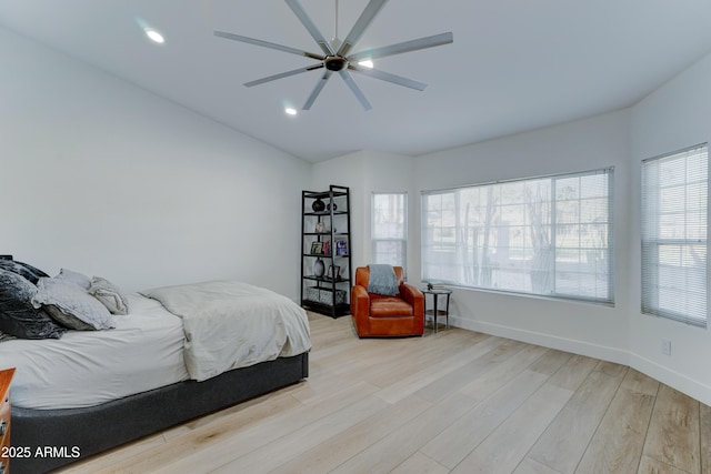 bedroom featuring recessed lighting, baseboards, ceiling fan, and light wood finished floors