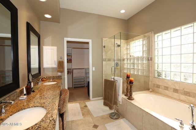32764 N 68th Pl, Scottsdale, AZ 85266 - full bath featuring a bath, a spacious closet, a stall shower, and a sink