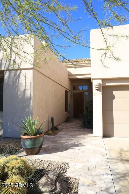 32764 N 68th Pl, Scottsdale, AZ 85266 - entrance to property with concrete driveway, a garage, and stucco siding