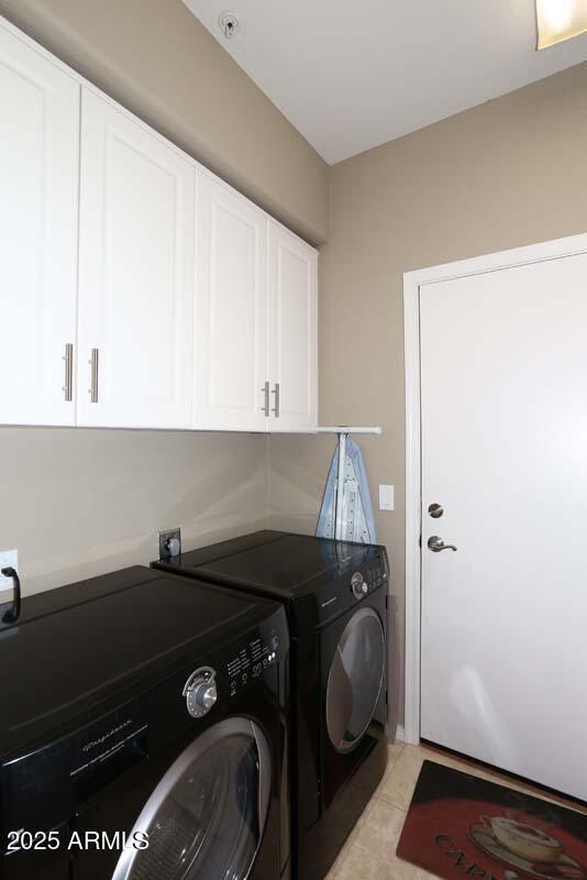 32764 N 68th Pl, Scottsdale, AZ 85266 - laundry area with cabinet space, separate washer and dryer, and light tile patterned flooring