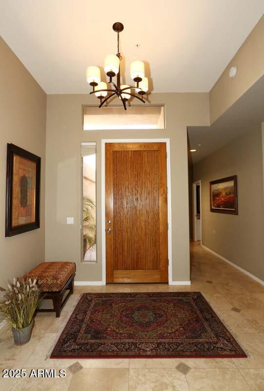 32764 N 68th Pl, Scottsdale, AZ 85266 - entryway with baseboards and an inviting chandelier