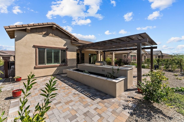 view of patio featuring a pergola