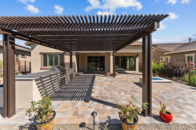 view of patio / terrace featuring a pergola and grilling area