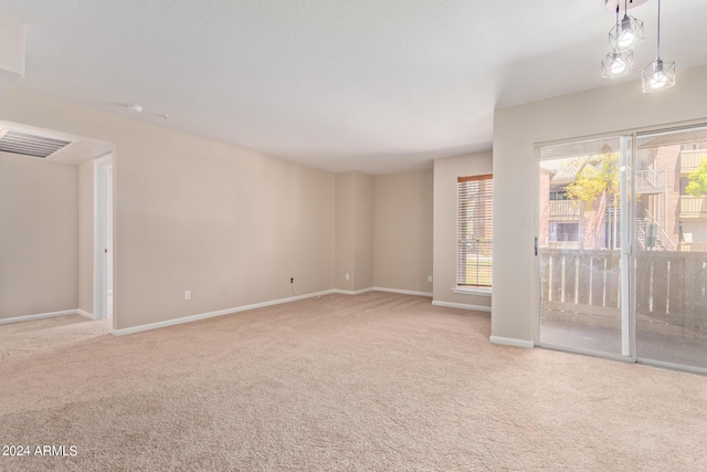 empty room featuring carpet flooring