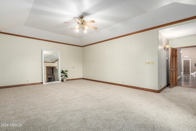 unfurnished room featuring carpet, ceiling fan, and a tray ceiling