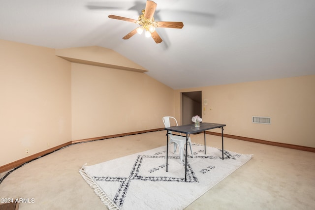 office with ceiling fan, vaulted ceiling, and carpet flooring