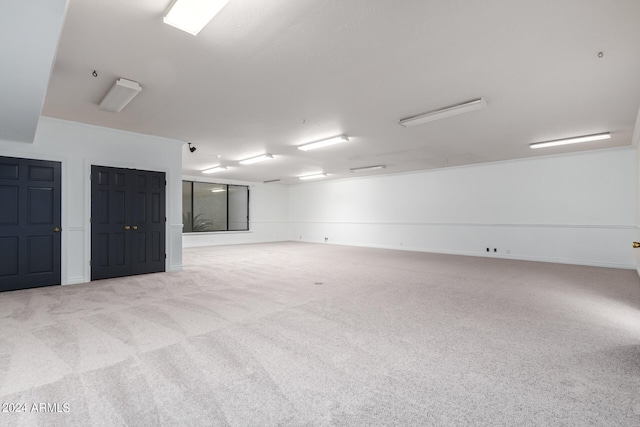 empty room featuring light carpet