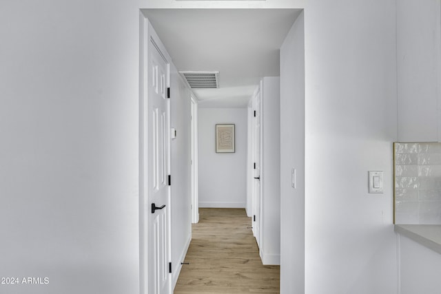 hallway featuring light hardwood / wood-style floors