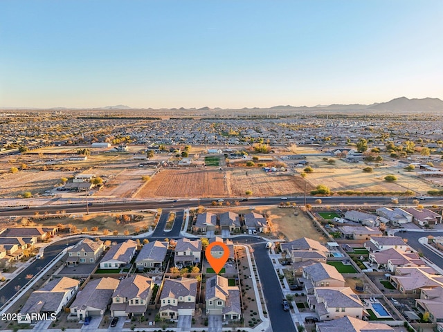 drone / aerial view featuring a mountain view