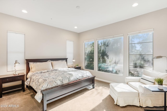 bedroom with light carpet