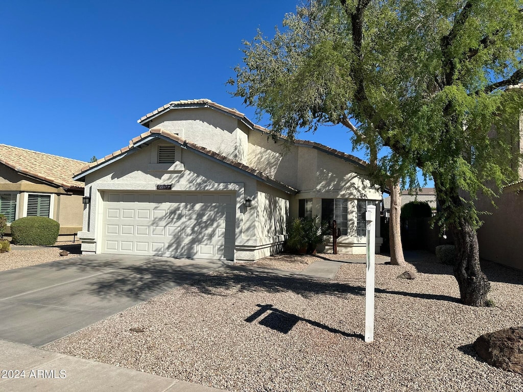 view of front of home with a garage