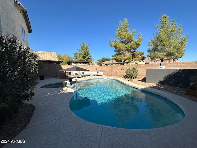 view of pool with a patio area