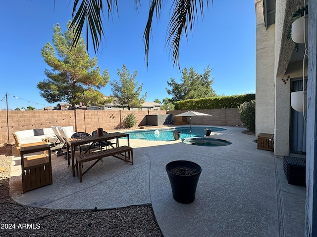 view of pool featuring a patio