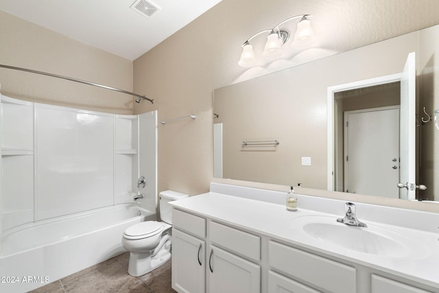 full bathroom featuring tile patterned flooring, vanity, toilet, and shower / bathtub combination