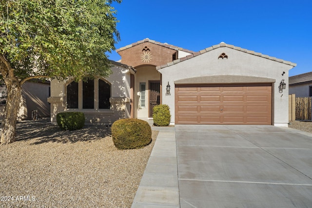 view of front of house with a garage