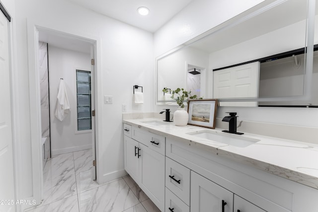 bathroom with shower / bathing tub combination and vanity