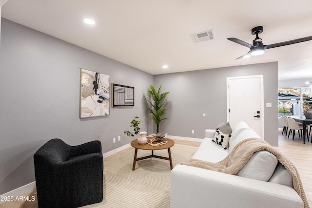 living room with ceiling fan