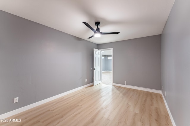 spare room with ceiling fan and light hardwood / wood-style floors