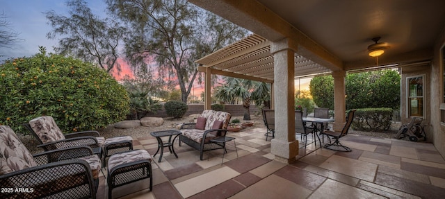 patio terrace at dusk with a pergola