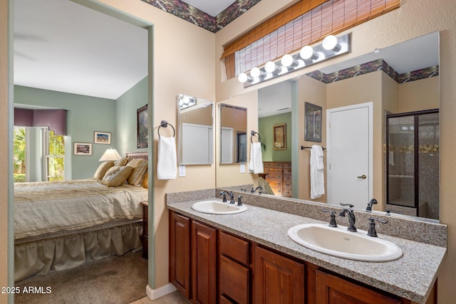 bathroom with vanity and an enclosed shower