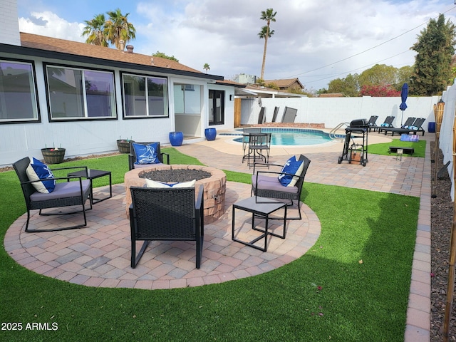 8431 E Rose Ln, Scottsdale, AZ 85250 - view of patio with an outdoor living space with a fire pit, a fenced backyard, and a fenced in pool