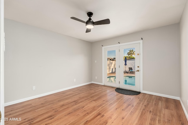 8431 E Rose Ln, Scottsdale, AZ 85250 - empty room featuring light wood finished floors, french doors, baseboards, and a ceiling fan