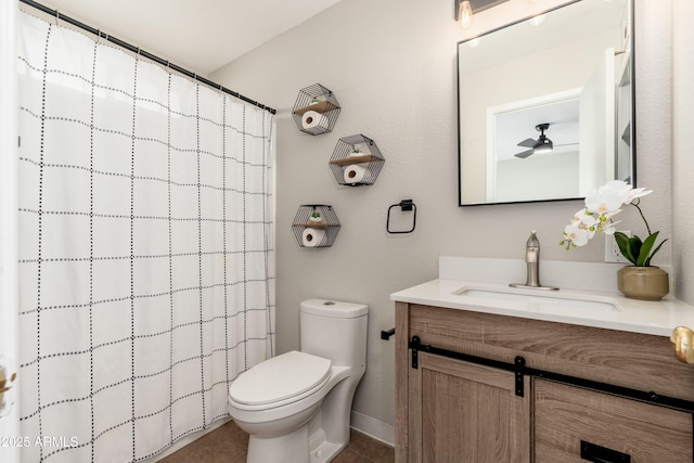 8431 E Rose Ln, Scottsdale, AZ 85250 - bathroom with baseboards, curtained shower, toilet, vanity, and tile patterned flooring