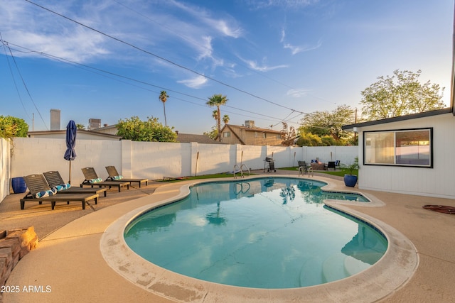 8431 E Rose Ln, Scottsdale, AZ 85250 - view of swimming pool with a fenced in pool, a patio area, and a fenced backyard