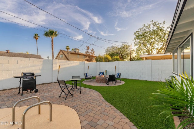 8431 E Rose Ln, Scottsdale, AZ 85250 - view of patio / terrace with a grill, a fenced backyard, and a fire pit