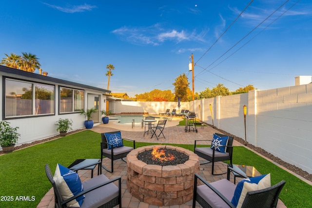 8431 E Rose Ln, Scottsdale, AZ 85250 - view of patio / terrace with a fenced in pool, a fenced backyard, and an outdoor fire pit