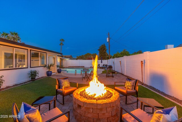 8431 E Rose Ln, Scottsdale, AZ 85250 - view of patio / terrace featuring an outdoor fire pit, a fenced backyard, and a fenced in pool