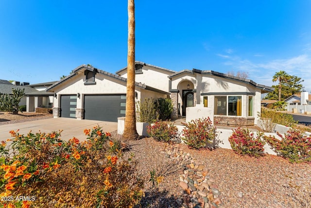 view of front of property with a garage