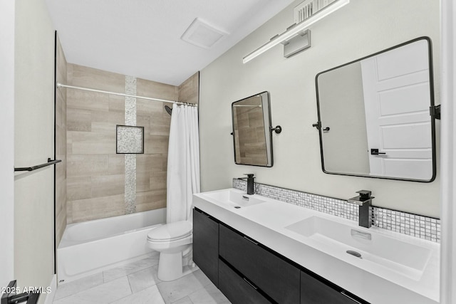 full bathroom featuring vanity, toilet, and shower / bath combo with shower curtain