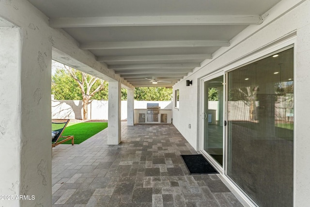 view of patio / terrace with area for grilling and exterior kitchen