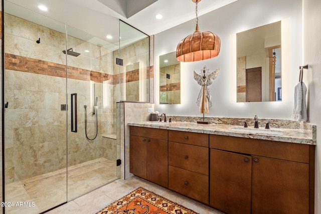 bathroom featuring vanity and walk in shower