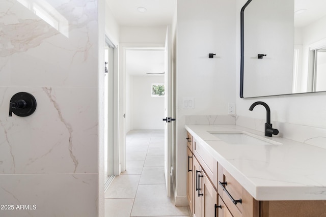 bathroom with vanity and tile patterned floors
