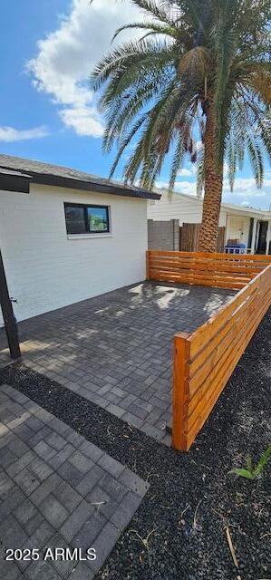 view of patio with fence