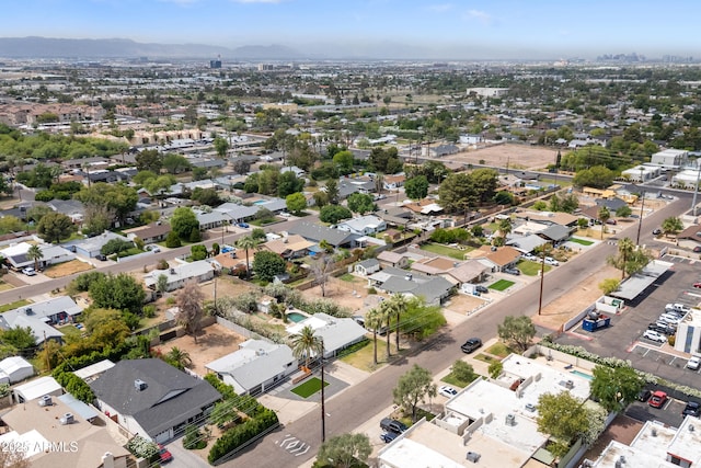 aerial view of residential area with mountains
