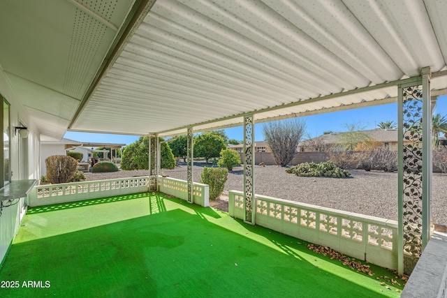 view of patio featuring fence