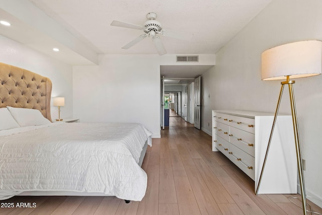 bedroom with recessed lighting, a ceiling fan, baseboards, visible vents, and light wood-type flooring