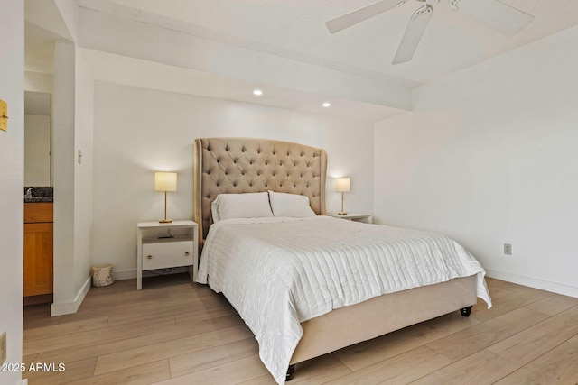 bedroom with light wood finished floors, ceiling fan, baseboards, and recessed lighting