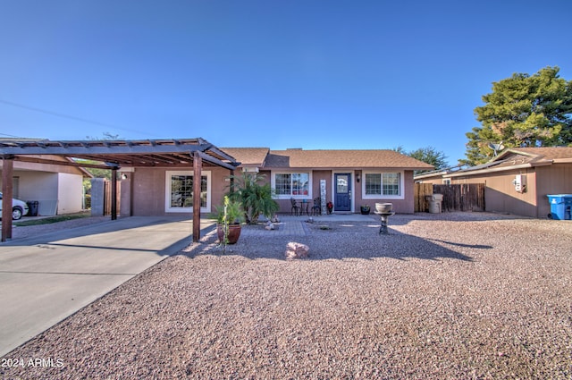 single story home with a carport