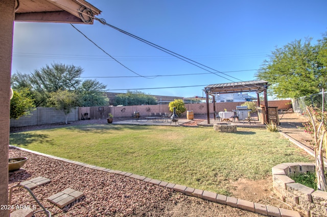 view of yard featuring a pergola and a patio area