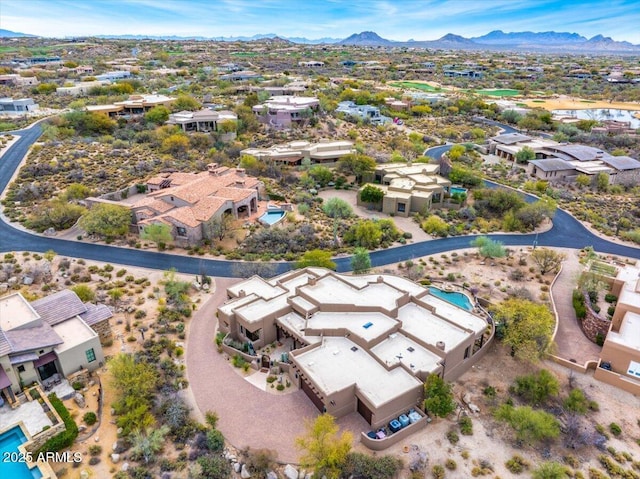 bird's eye view with a mountain view